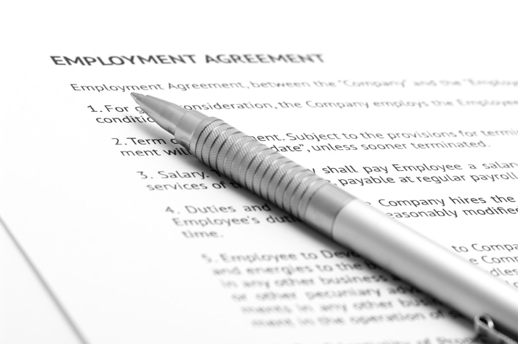 Employment Contracts employment form and pen