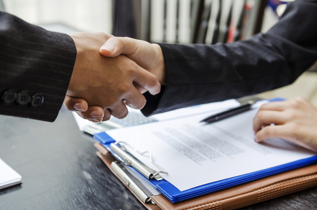 Wage and Hour Disputes shaking hands